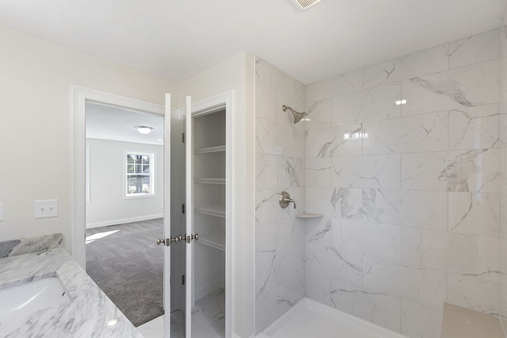 183 Rangeway Road Billerica, MA 01862 - Photo 9 of 14 a bathroom with a shower