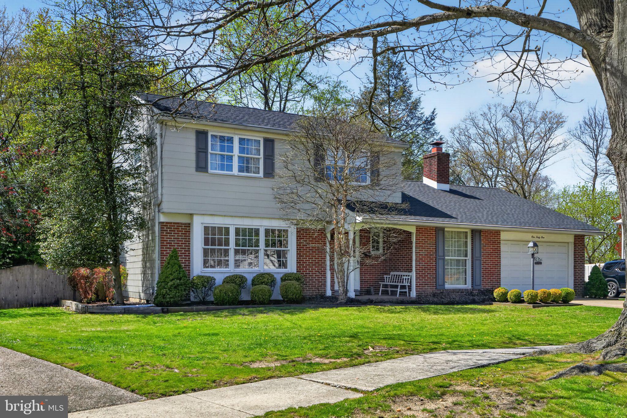 141 Parkview Road Stratford, NJ 08084 - Photo 1 of 48 Charming two-story home with lush greenery.