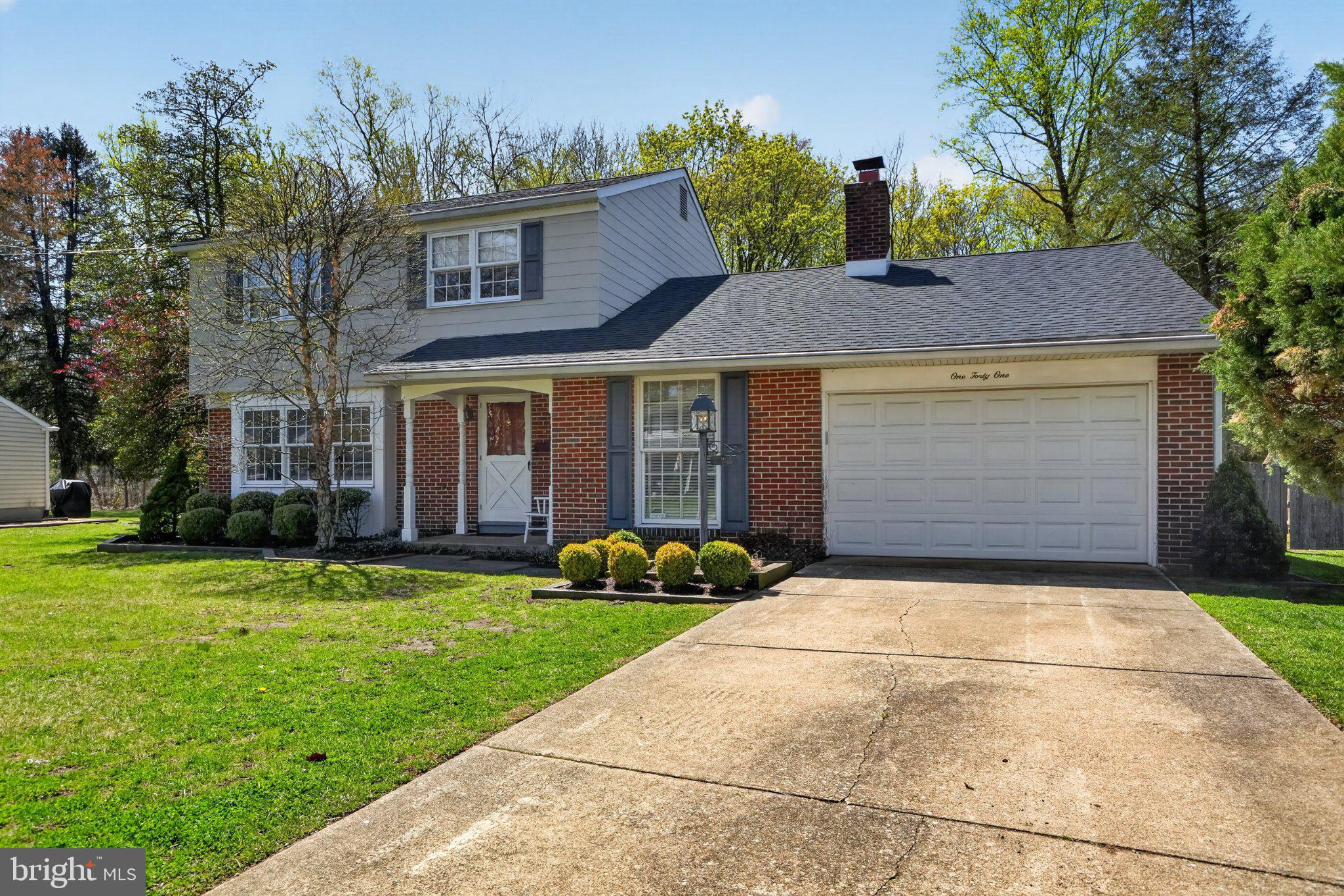 141 Parkview Road Stratford, NJ 08084 - Photo 4 of 48 Charming home with lush greenery.