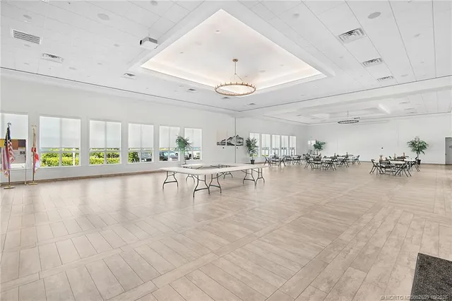a view of a living room and kitchen
