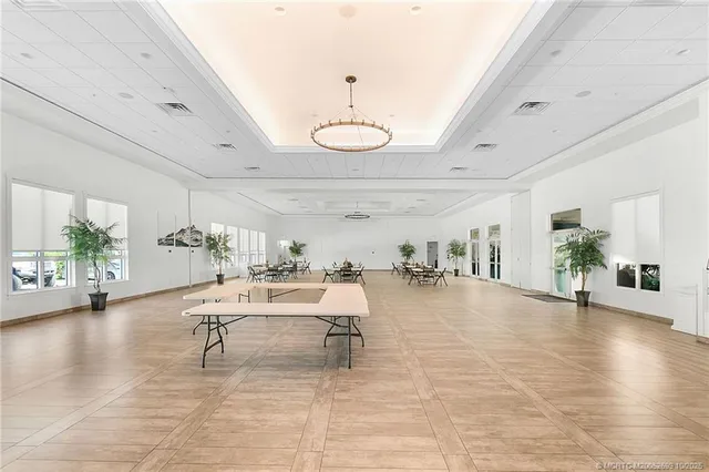 a view of a livingroom with furniture and wooden floor