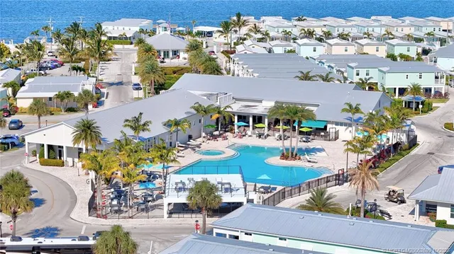 an aerial view of residential houses and outdoor space