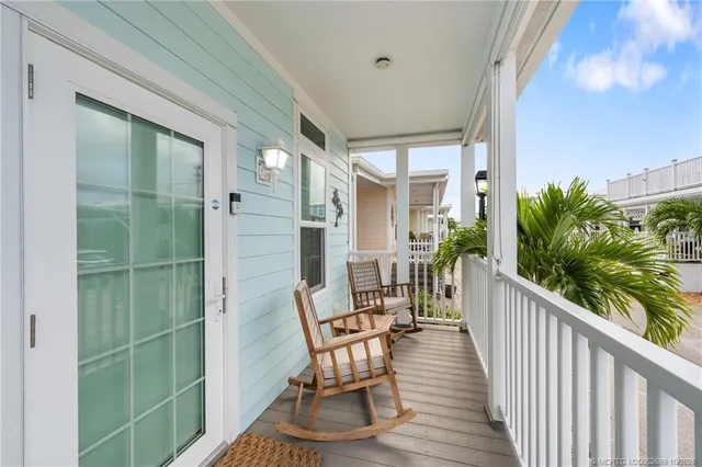 a view of balcony with furniture