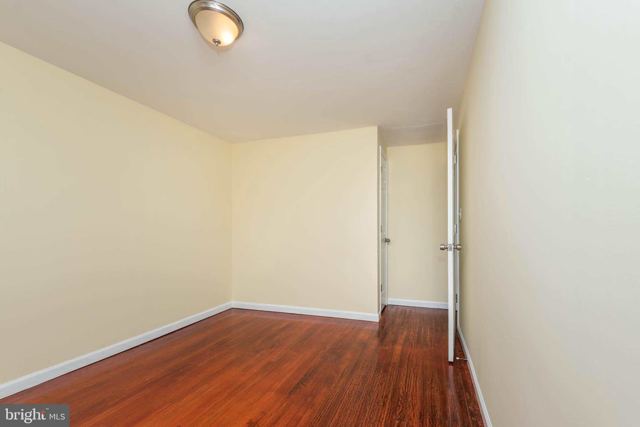 1010 Andover Road Baltimore, MD 21218 - Photo 17 of 34 a view of a room with wooden floor