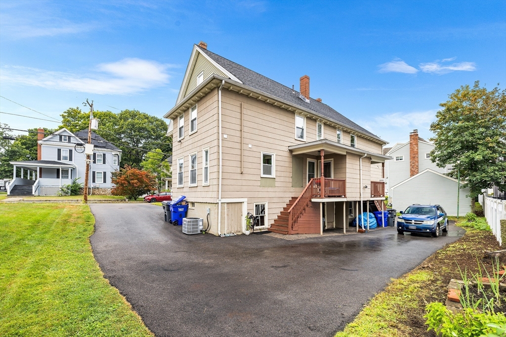4 State Street, Unit 4 Milford, MA 01757 - Photo 3 of 23 a view of street with parked cars