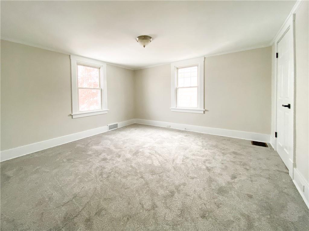 476 Mecklem Avenue Rochester, PA 15074 - Photo 18 of 28 a view of an empty room with a window
