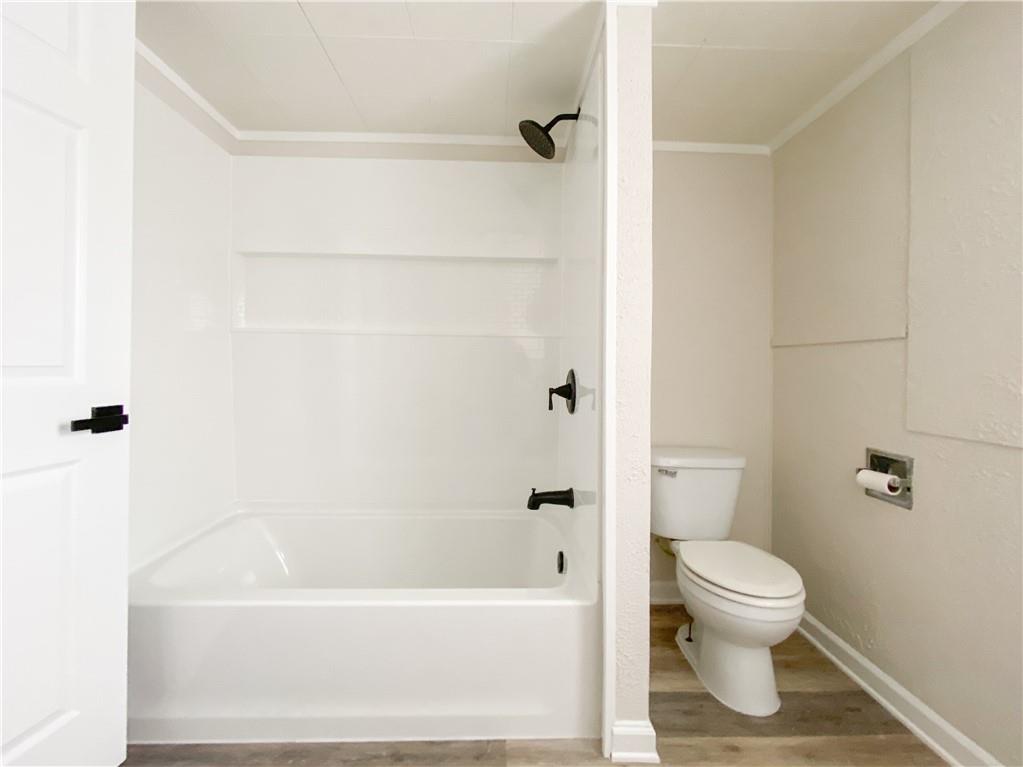 476 Mecklem Avenue Rochester, PA 15074 - Photo 21 of 28 a bathroom with a toilet and a bathtub