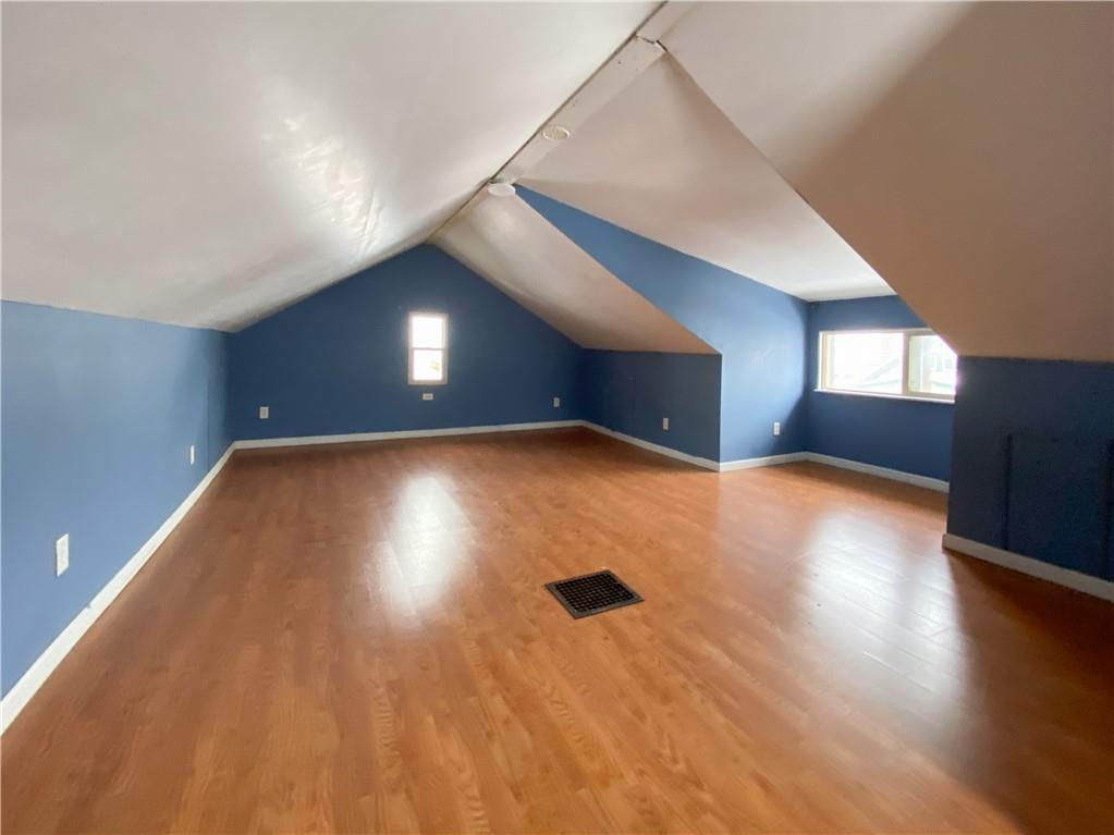 476 Mecklem Avenue Rochester, PA 15074 - Photo 26 of 28 a view of an empty room with wooden floor
