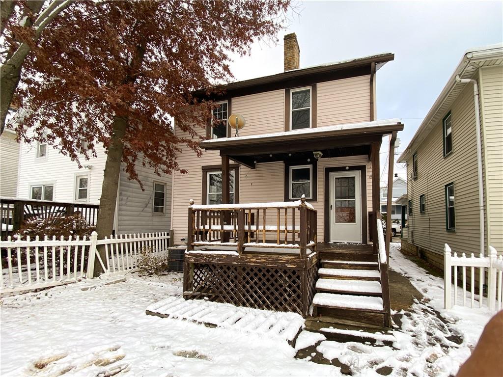476 Mecklem Avenue Rochester, PA 15074 - Photo 4 of 28 a view of a house with wooden fence