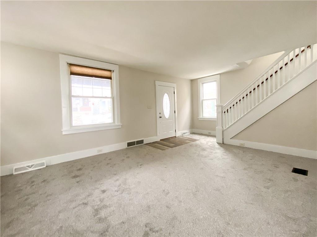 476 Mecklem Avenue Rochester, PA 15074 - Photo 9 of 28 a view of an empty room with a window