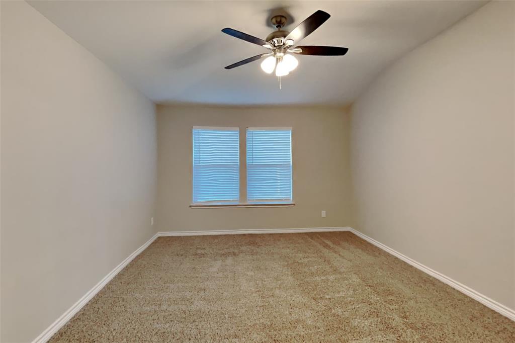 105 Independence Trail Forney, TX 75126 - Photo 9 of 18 an empty room with a window