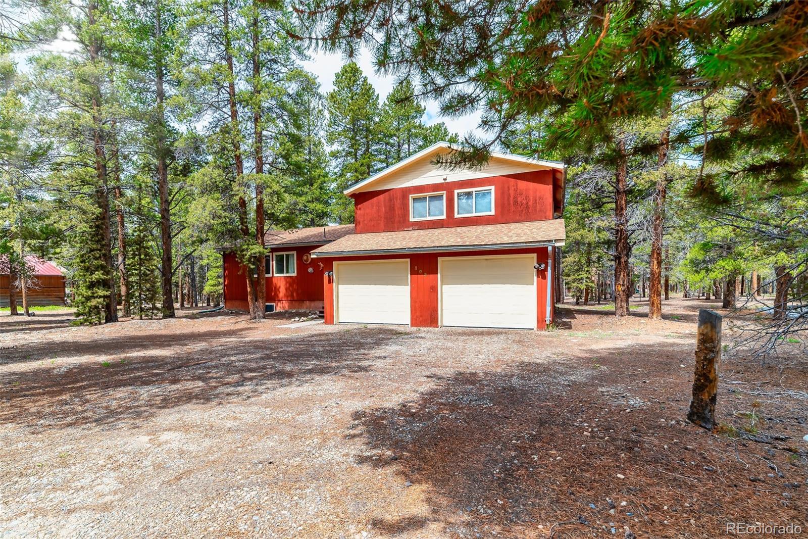 103 County Road 4C-E Leadville, CO 80461 - Photo 1 of 40 a front view of a house with a yard