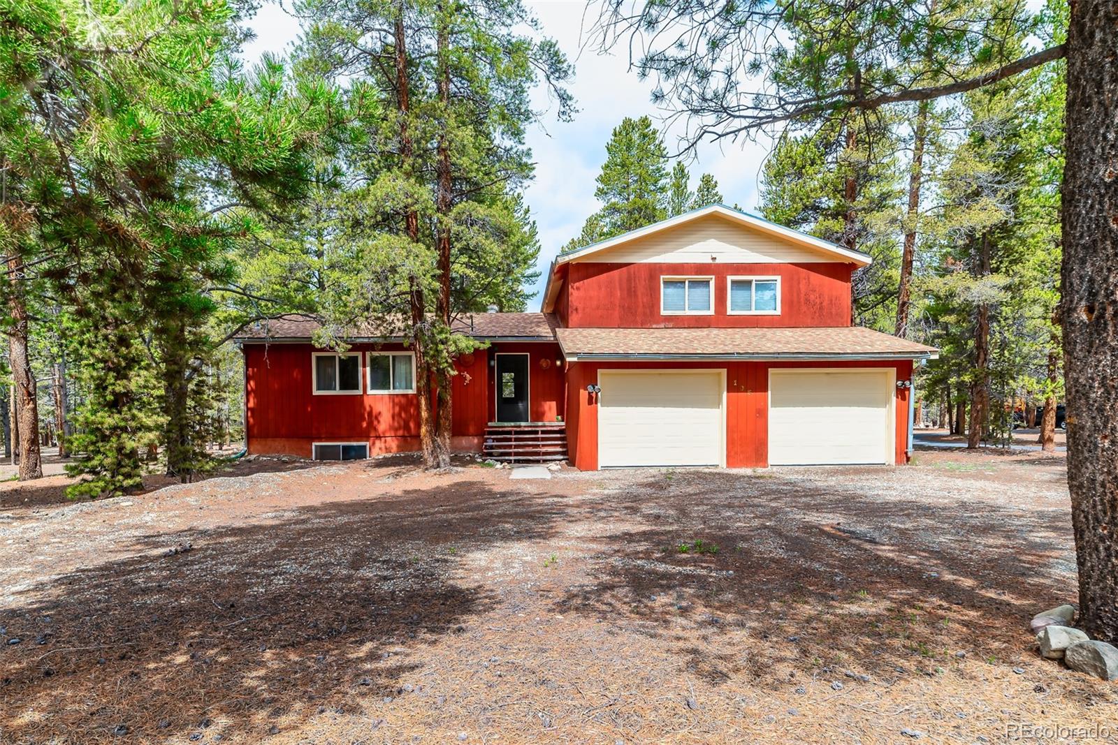 103 County Road 4C-E Leadville, CO 80461 - Photo 2 of 40 a front view of a house with a yard