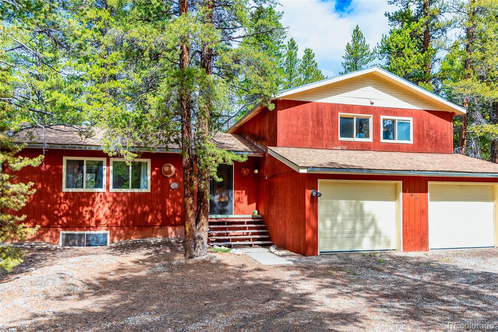 103 County Road 4C-E Leadville, CO 80461 - Photo 5 of 40 a front view of a house with a garage