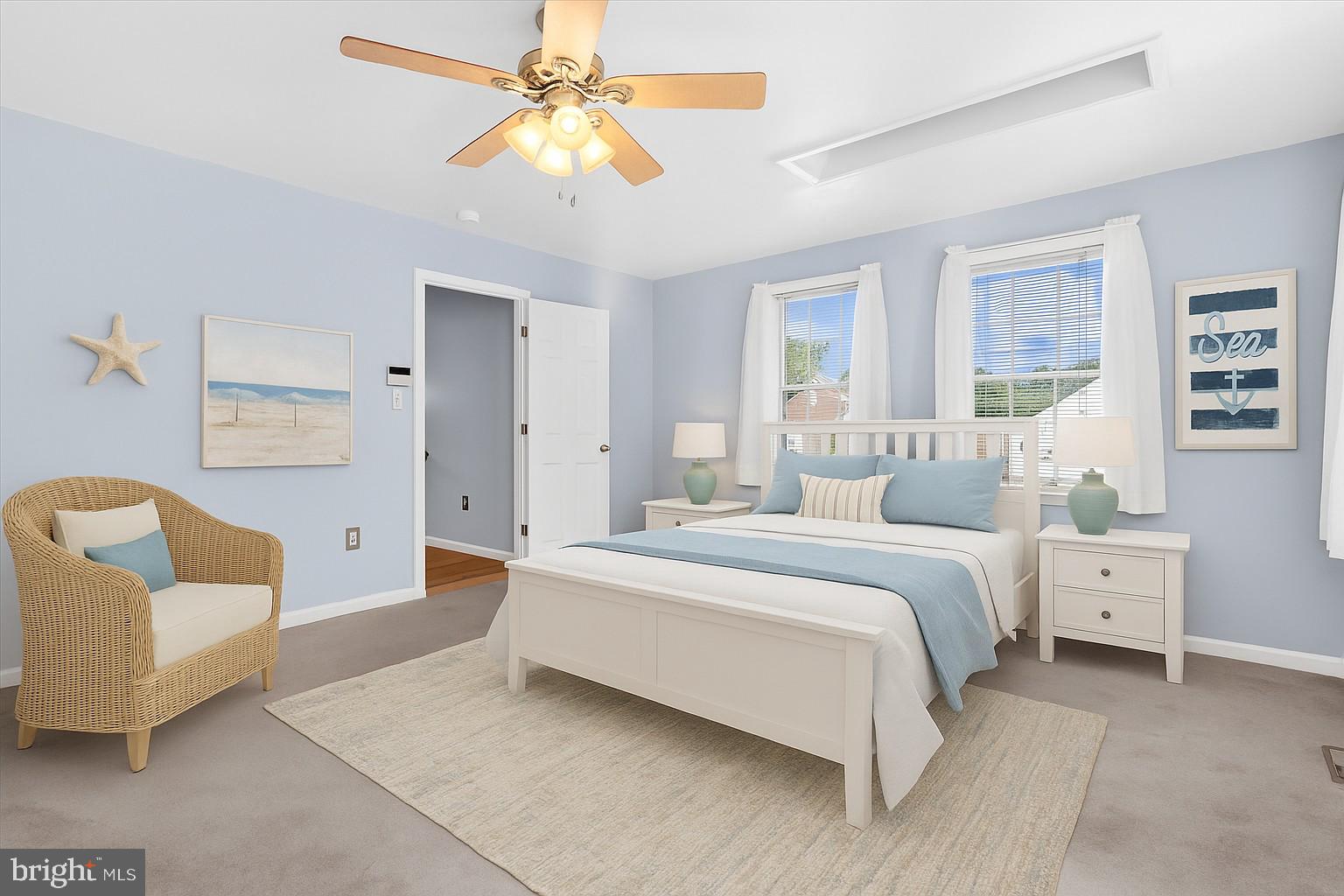 931 Oakleigh Beach Road Baltimore, MD 21222 - Photo 16 of 52 a spacious bedroom with a bed and a couch