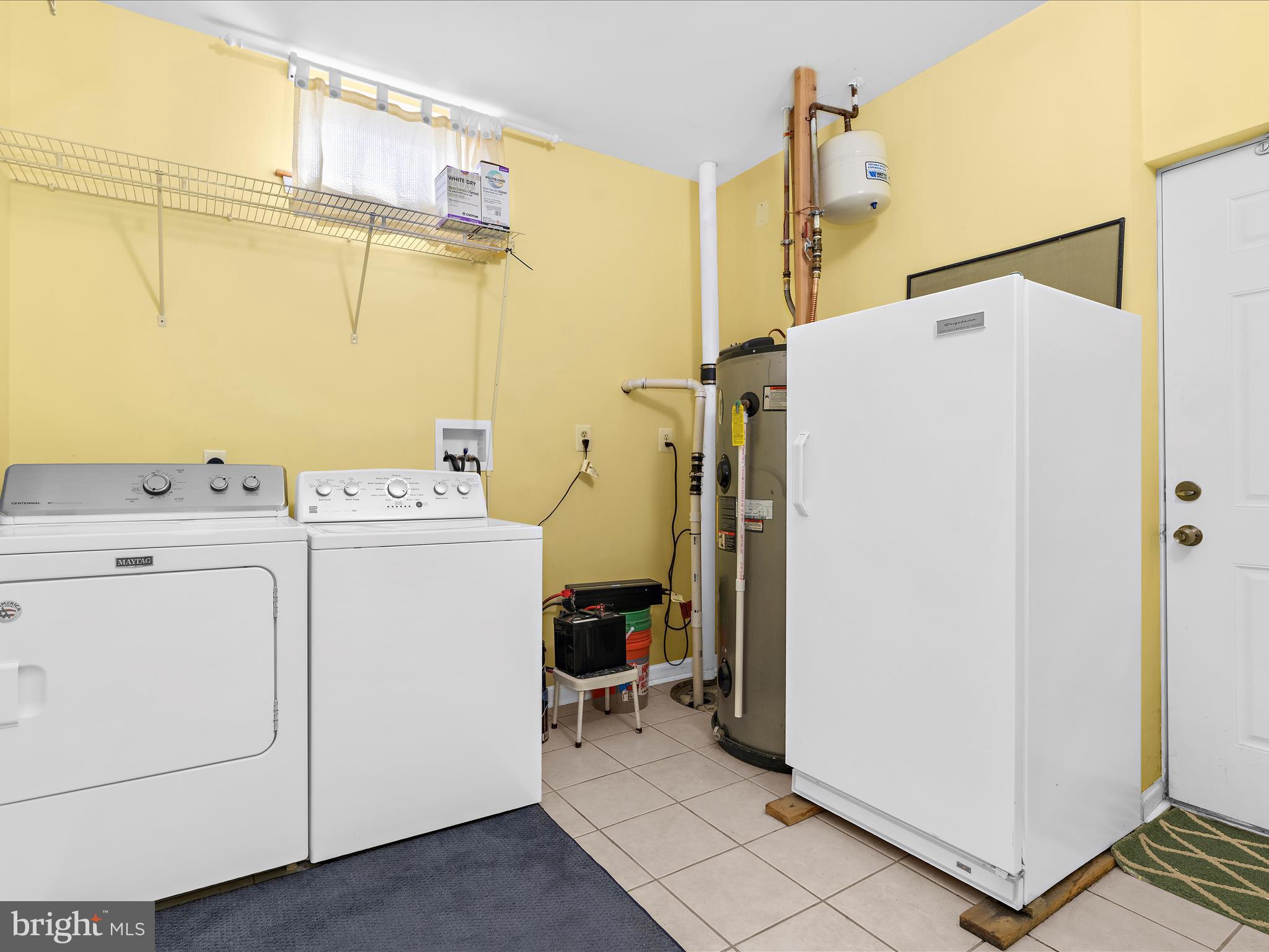 931 Oakleigh Beach Road Baltimore, MD 21222 - Photo 36 of 52 a utility room with dryer and washer