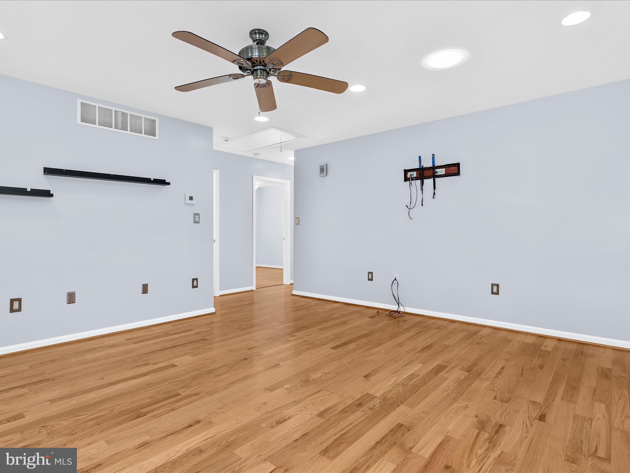 931 Oakleigh Beach Road Baltimore, MD 21222 - Photo 6 of 52 wooden floor in an empty room