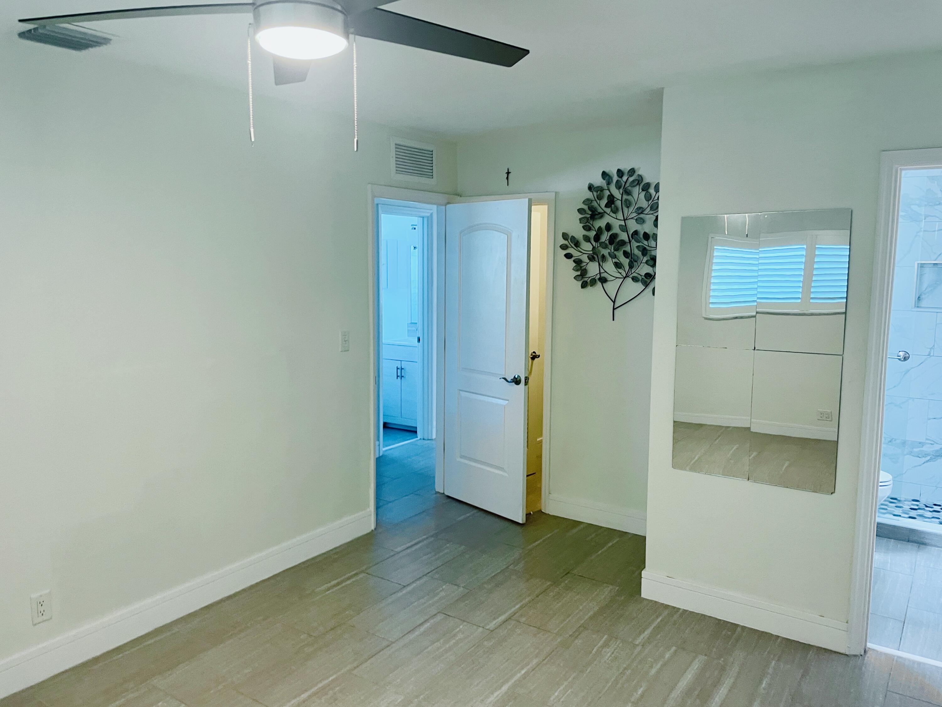 2100 Northeast 38th Street, Unit 142 Lighthouse Point, FL 33064 - Photo 21 of 42 Main Bedroom (2)