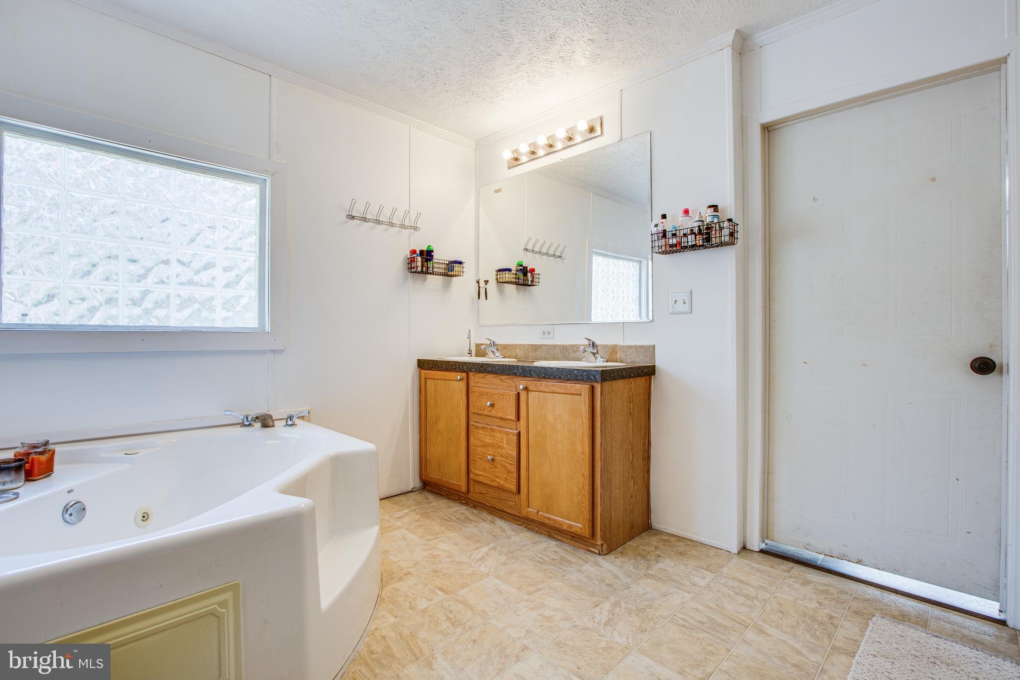 4316 Shepherds Road Partlow, VA 22534 - Photo 39 of 54 Soaking tub and double sinks