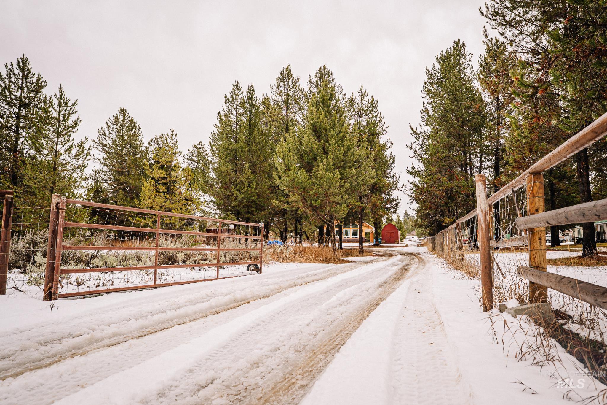 22 West Prospectors Drive Cascade, ID 83611 - Photo 2 of 25 View of street featuring a gate