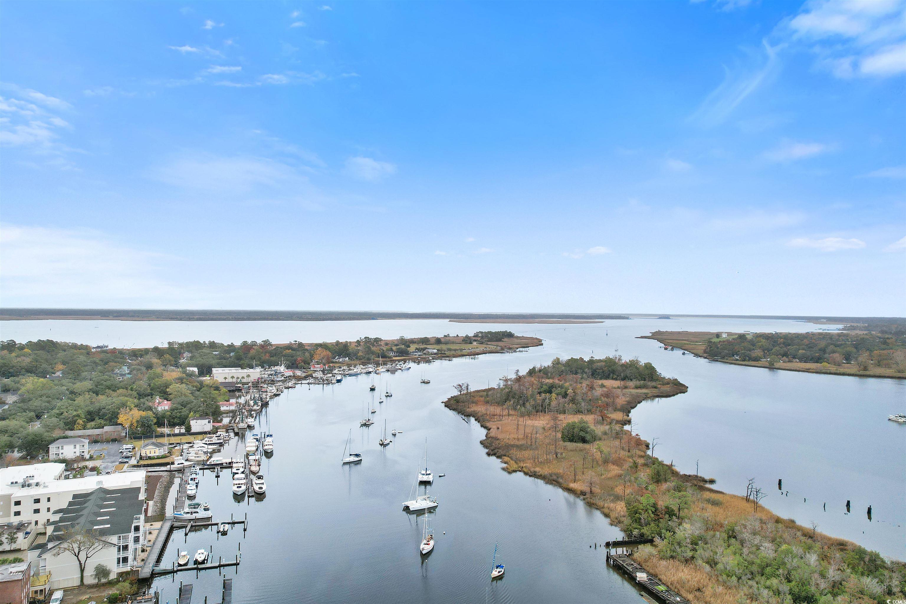 141 Feather Drive Georgetown, SC 29440 - Photo 30 of 34 Water view with a marina