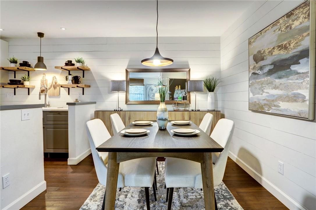 8210 Bent Tree Road, Unit 136 Austin, TX 78759 - Photo 2 of 20 Dining area featuring dark wood finished floors