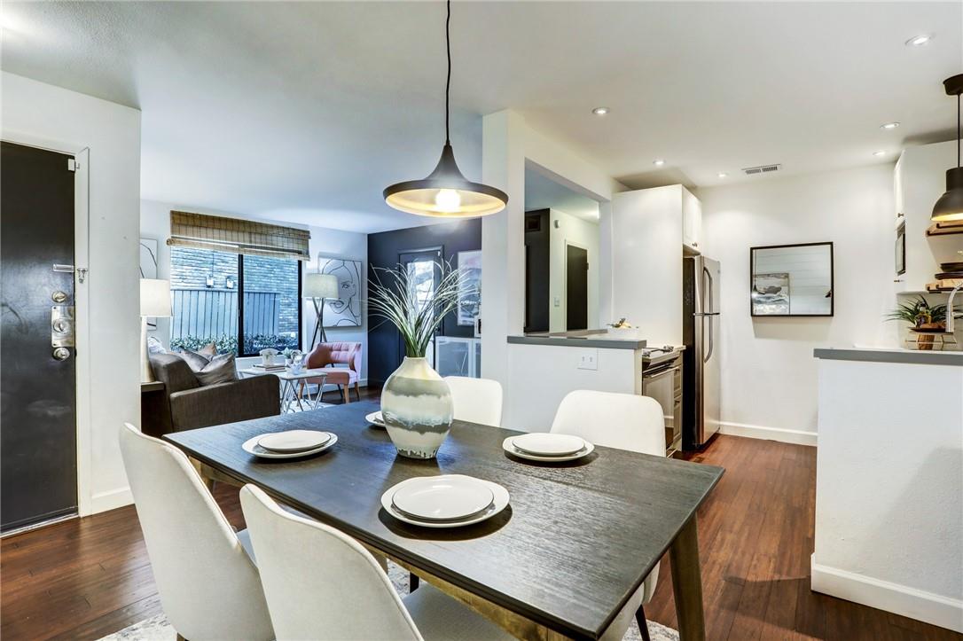 8210 Bent Tree Road, Unit 136 Austin, TX 78759 - Photo 3 of 20 Dining space featuring dark wood-style flooring