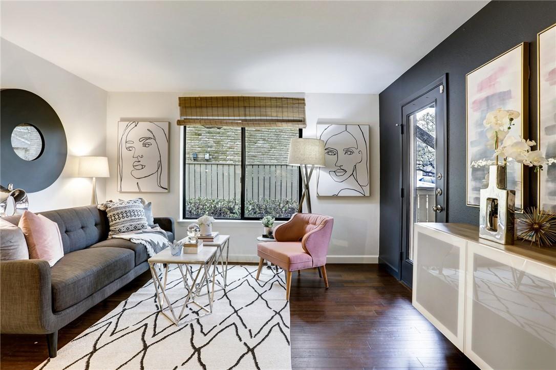 8210 Bent Tree Road, Unit 136 Austin, TX 78759 - Photo 8 of 20 Living area with dark wood finished floors and baseboards