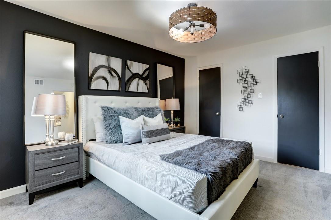 8210 Bent Tree Road, Unit 136 Austin, TX 78759 - Photo 9 of 20 Bedroom featuring carpet floors and baseboards