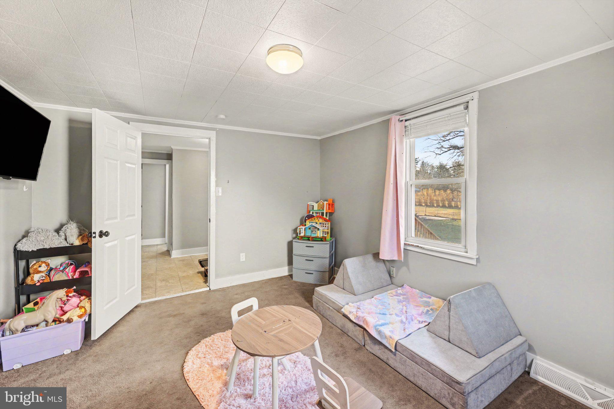 1002 Goodyear Road Gardners, PA 17324 - Photo 13 of 32 a living room with furniture and a flat screen tv