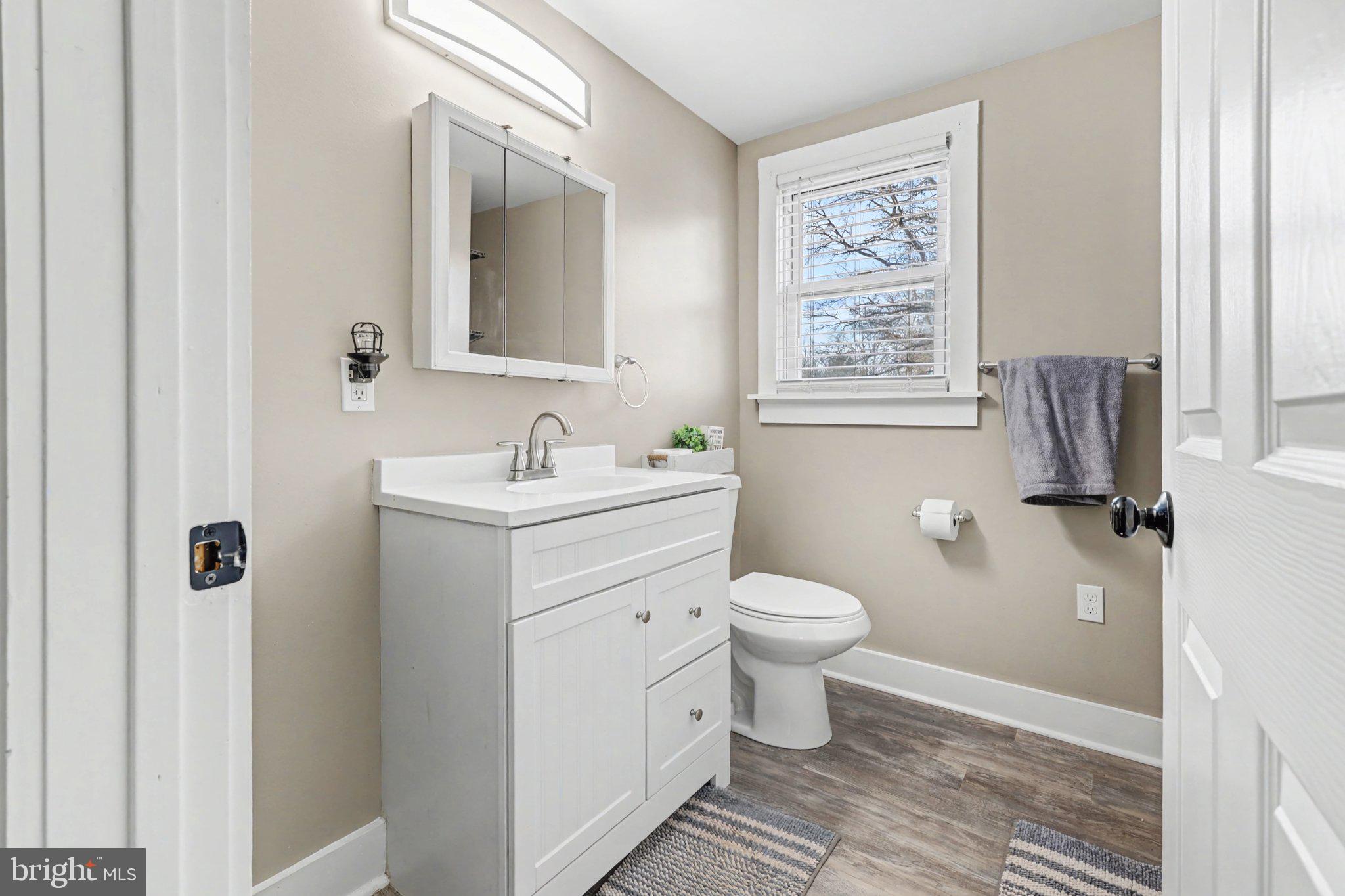 1002 Goodyear Road Gardners, PA 17324 - Photo 16 of 32 a bathroom with a toilet sink and mirror