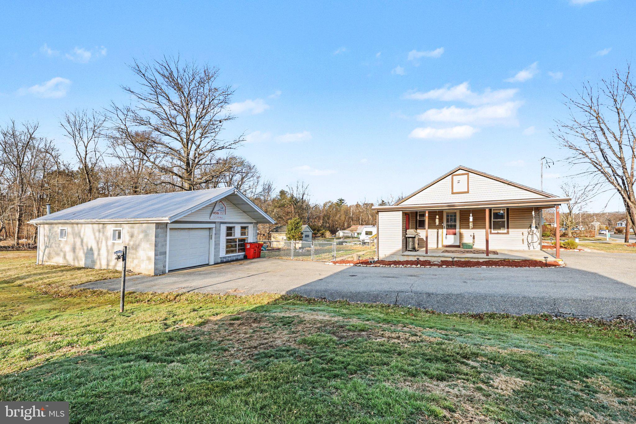 1002 Goodyear Road Gardners, PA 17324 - Photo 27 of 32 a big house with a big yard and large trees