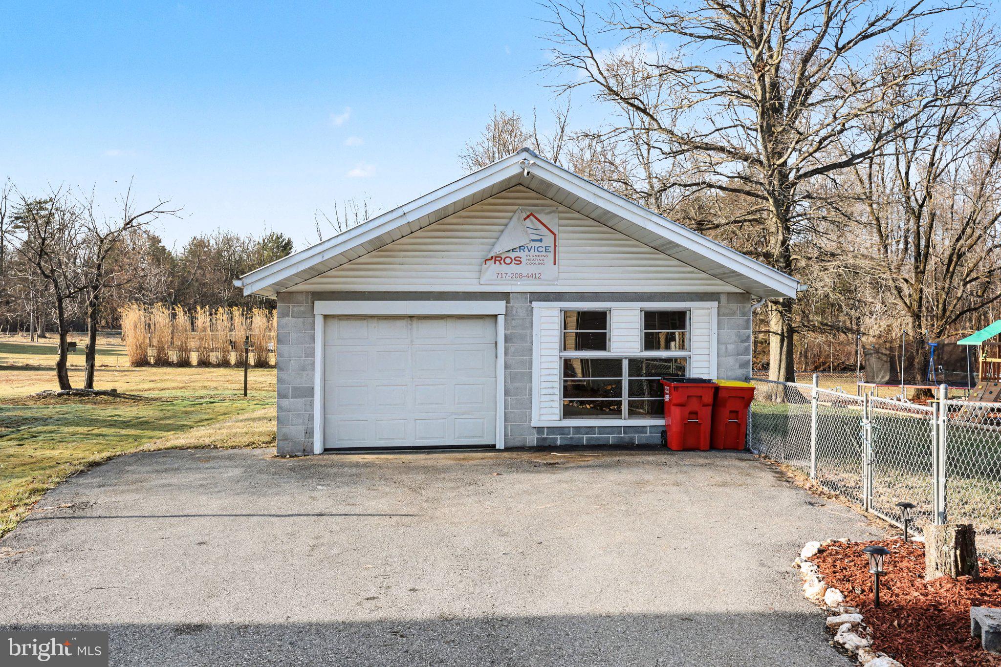 1002 Goodyear Road Gardners, PA 17324 - Photo 28 of 32 a view of a house with a garden and pathway