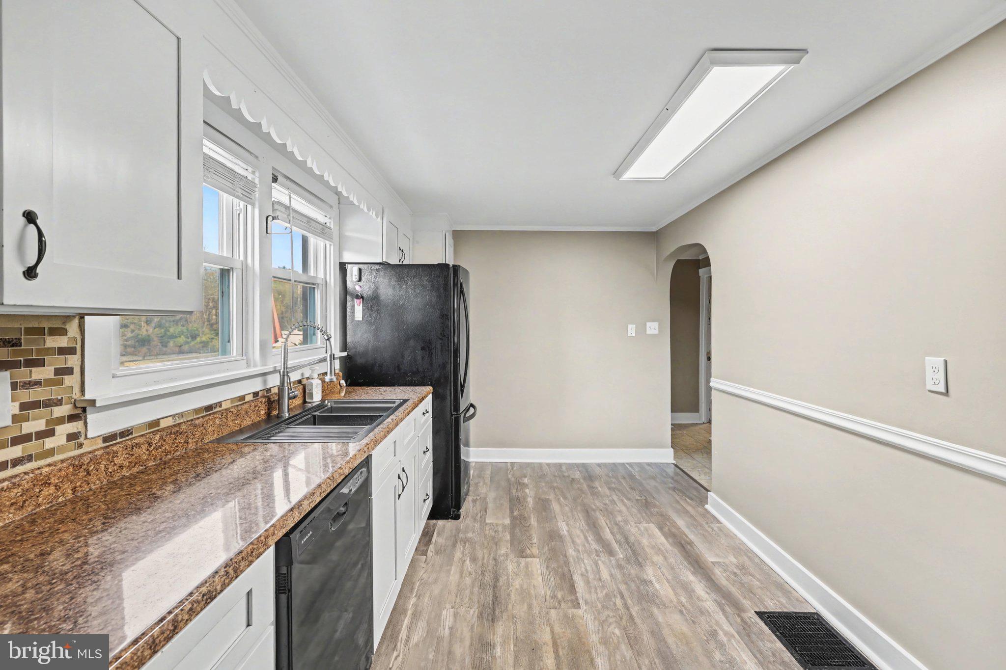 1002 Goodyear Road Gardners, PA 17324 - Photo 6 of 32 a kitchen with a sink stove and refrigerator