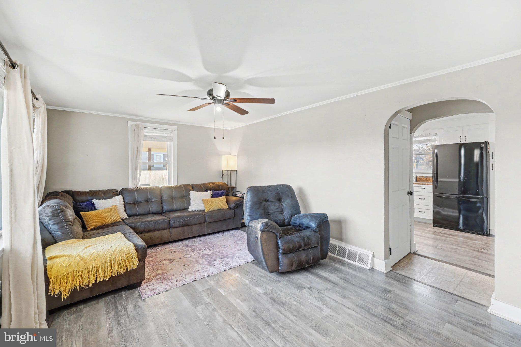 1002 Goodyear Road Gardners, PA 17324 - Photo 8 of 32 a living room with furniture and a ceiling fan