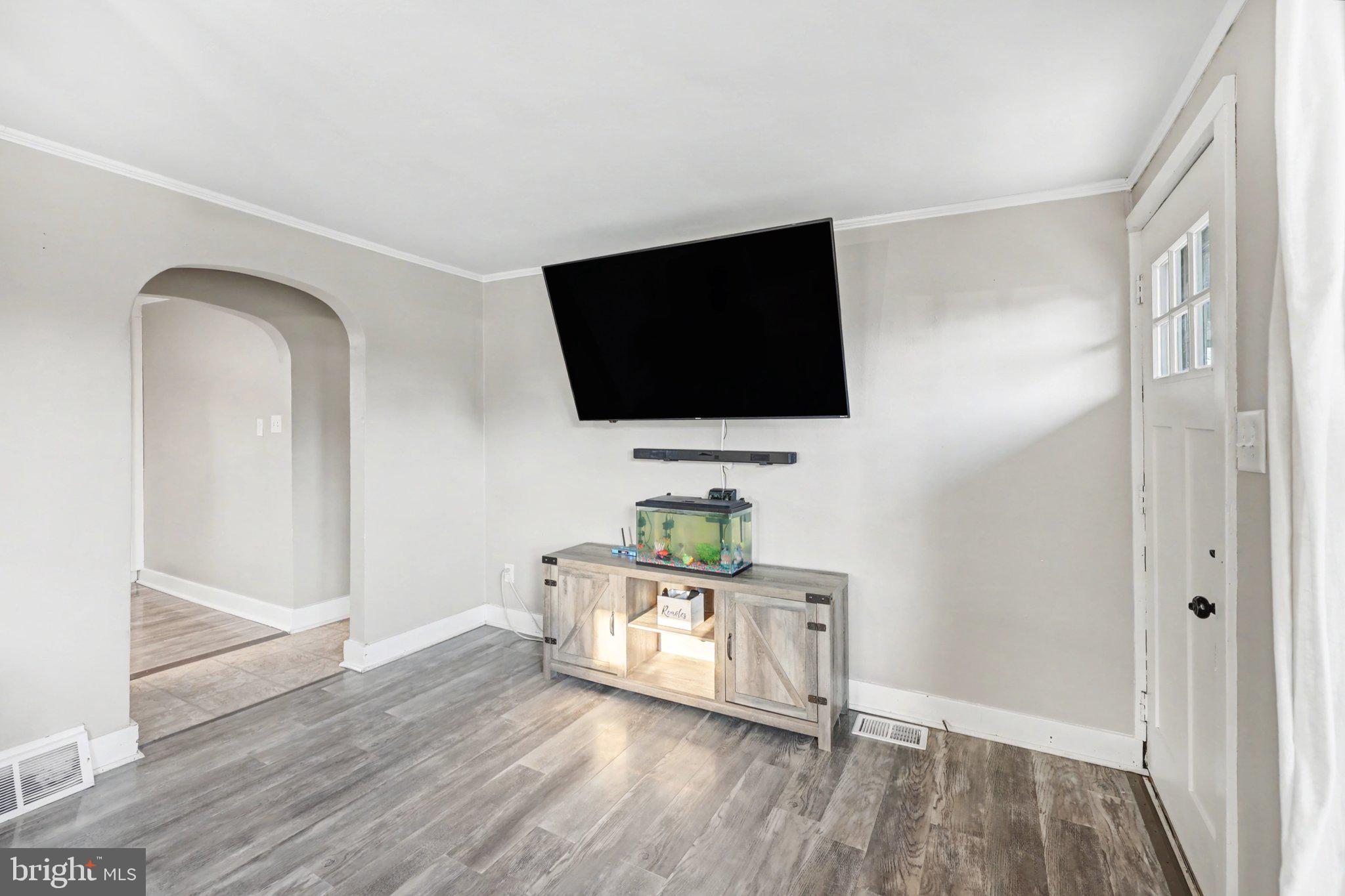 1002 Goodyear Road Gardners, PA 17324 - Photo 10 of 32 a living room with furniture and a flat screen tv