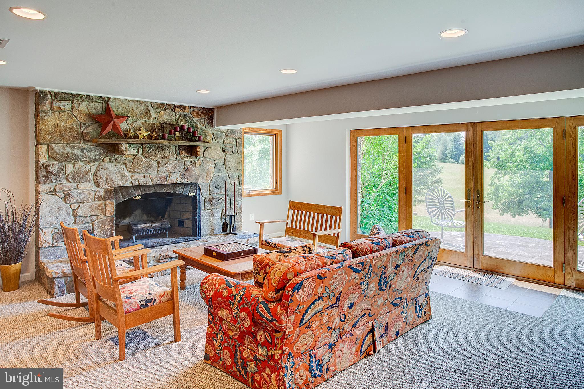 20781 Unison Road Round Hill, VA 20141 - Photo 44 of 64 Lower level has stone fireplace