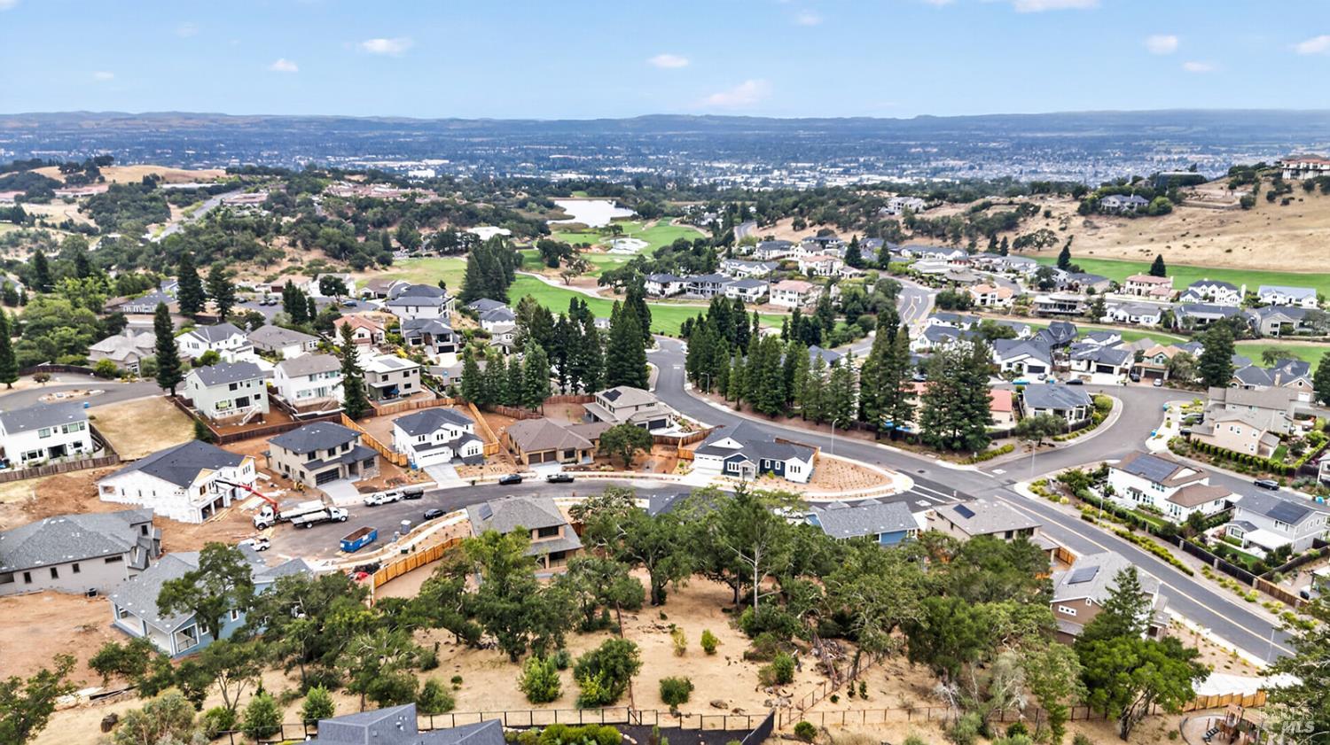 1907 Carlile Place Santa Rosa, CA 95403 - Photo 55 of 55 Here is an aerial view of Carlile Place, looking southeast over the Fountaingrove Golf and Country Club and Santa Rosa. Just beyond those distant mountains lies the Pacific Ocean, just a little over a 60-minute drive from here. This community is also approx. 60 miles from the Goldan Gate Bridge and San Francisco. Make this place your family's next home!