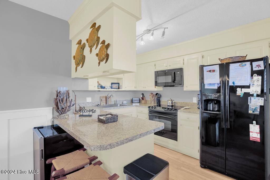 1896 New River Inlet Road, Unit 1219 North Topsail Beach, NC 28460 - Photo 5 of 48 IMG_5627