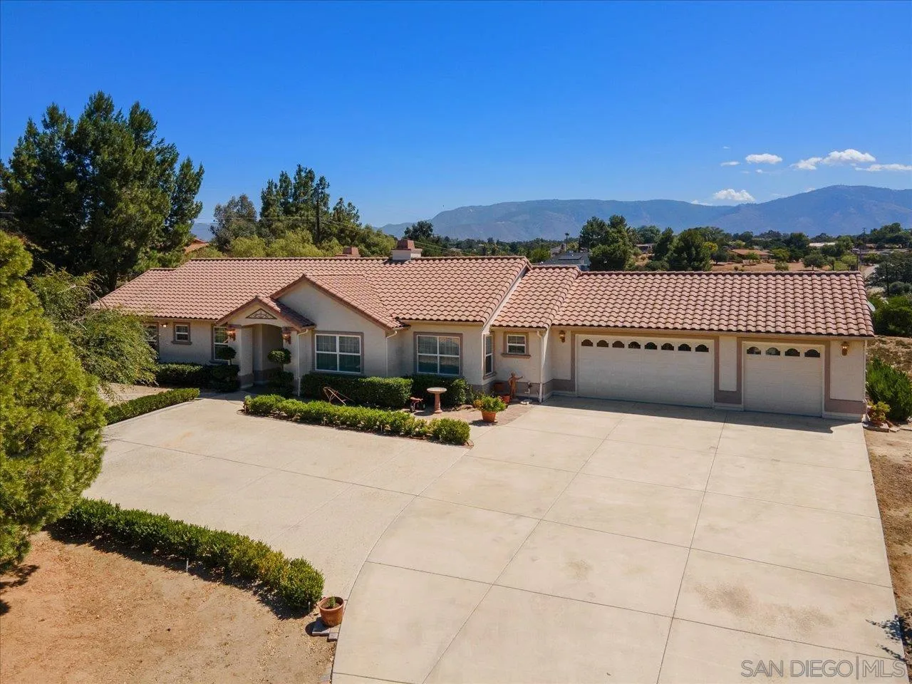 13669 Acorn Circle Valley Center, CA 92082 - Photo 1 of 33 a front view of a house with a yard