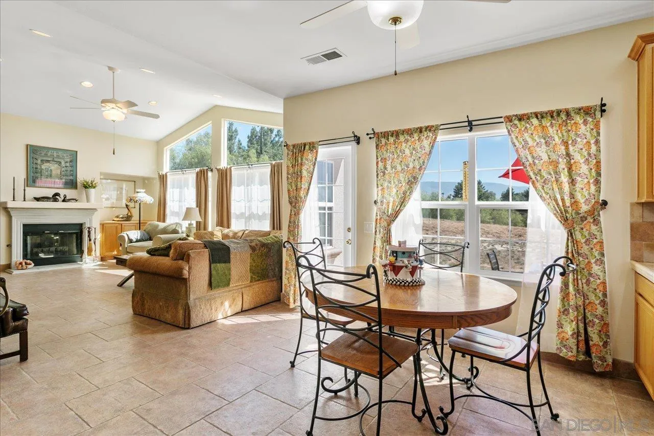 13669 Acorn Circle Valley Center, CA 92082 - Photo 16 of 33 a view of a dining room with furniture window and outside view