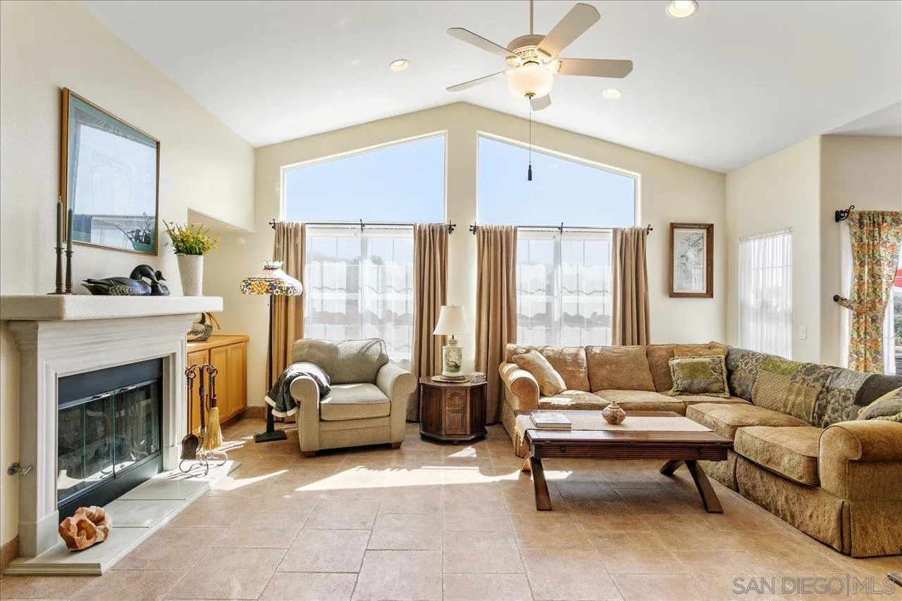 13669 Acorn Circle Valley Center, CA 92082 - Photo 17 of 33 a living room with furniture and a fireplace