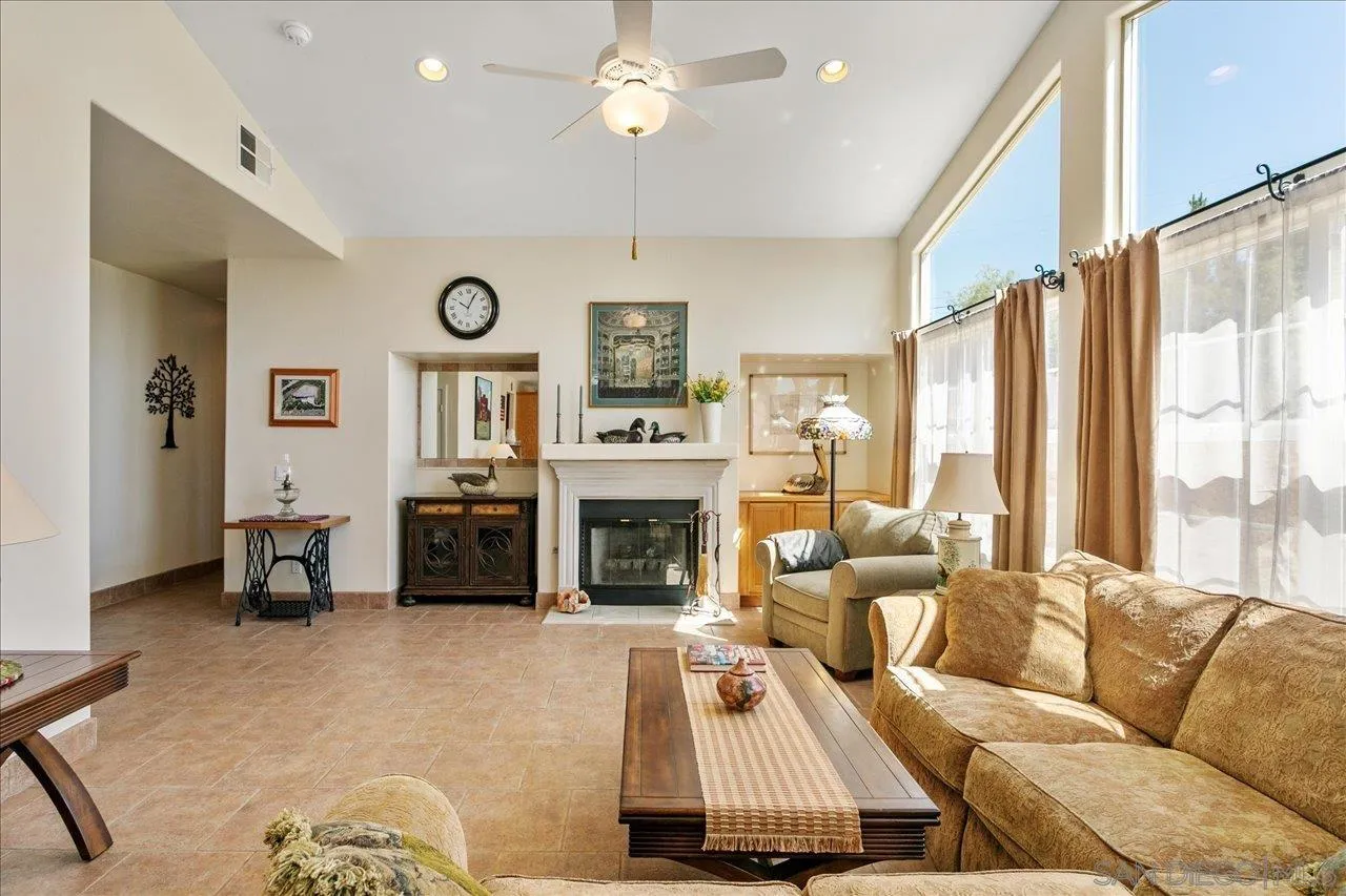 13669 Acorn Circle Valley Center, CA 92082 - Photo 19 of 33 a living room with furniture fireplace and flat screen tv