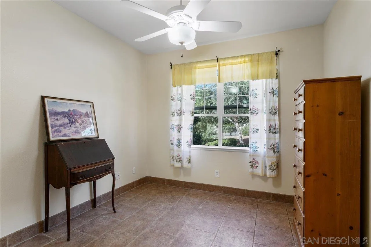 13669 Acorn Circle Valley Center, CA 92082 - Photo 27 of 33 a living room with furniture and a window