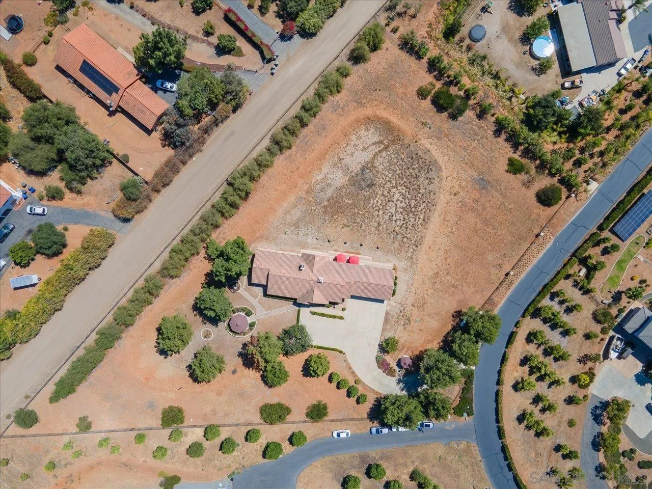13669 Acorn Circle Valley Center, CA 92082 - Photo 4 of 33 an aerial view of a house with a garden