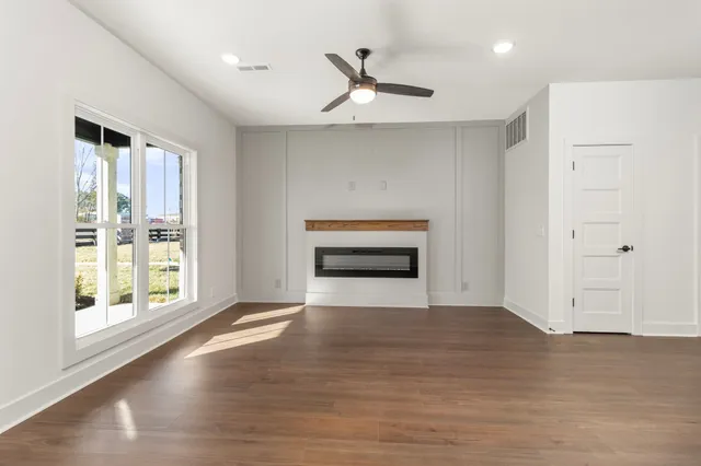 a kitchen with a stove microwave and cabinets