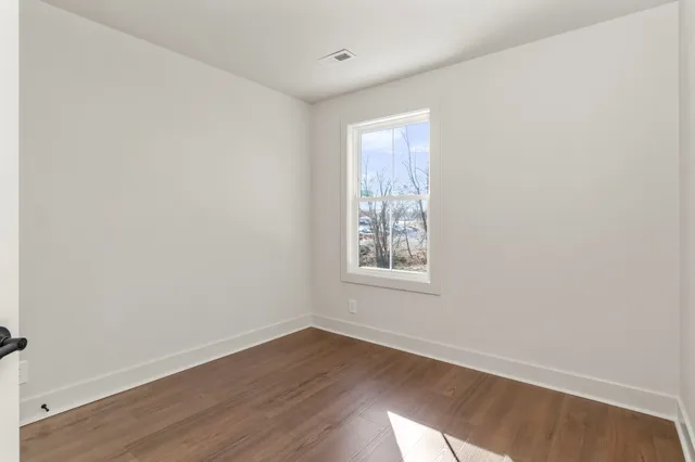 a view of a small space with racks on the wall