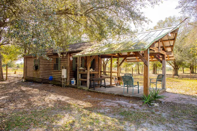a front view of a house with a large window