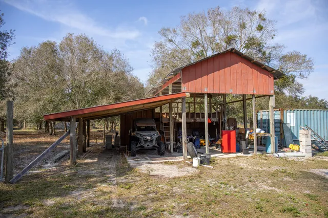 a view of a swimming pool with a patio