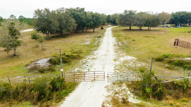 a view of a lake with a yard